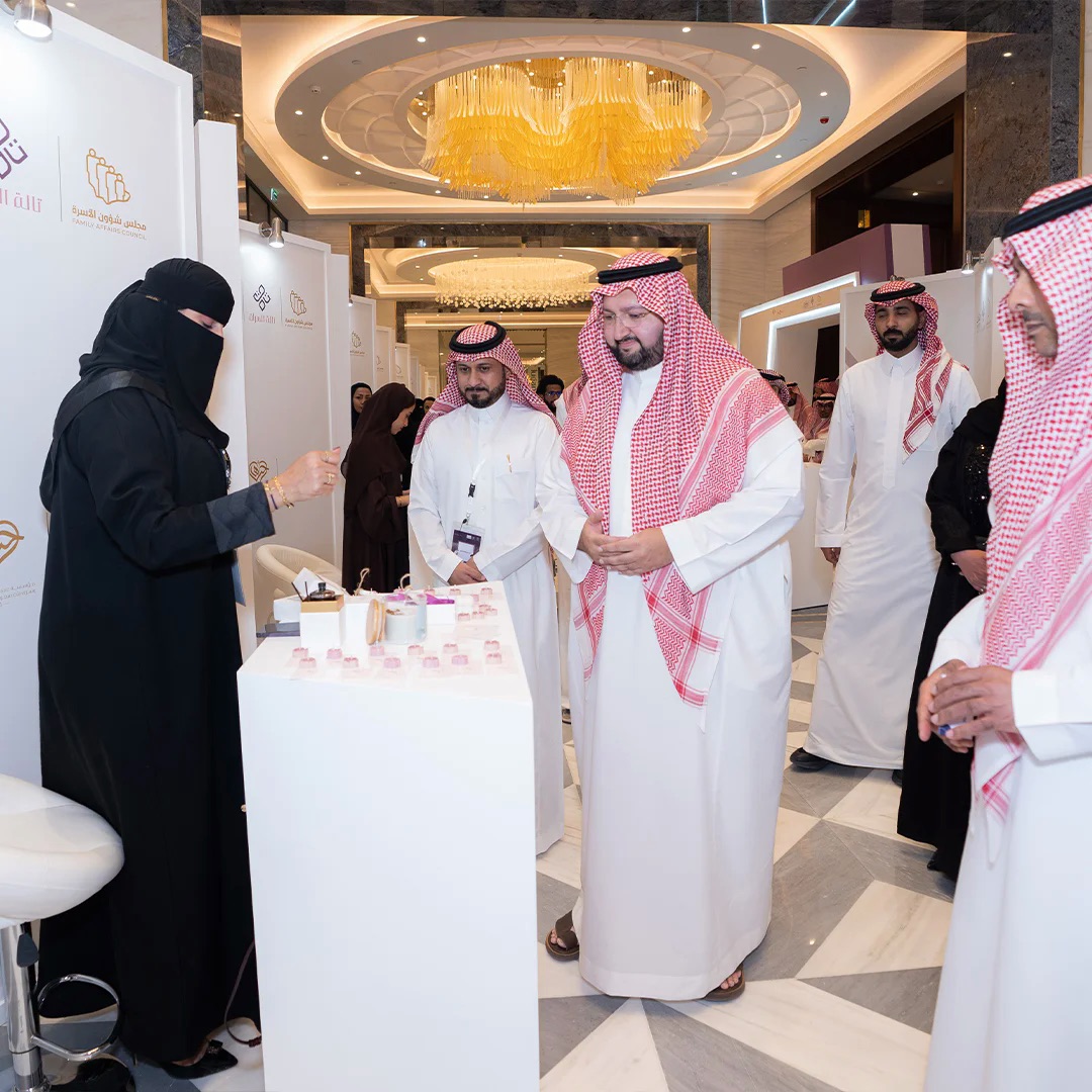 Guests tour the participants' projects in the closing ceremony's exhibition