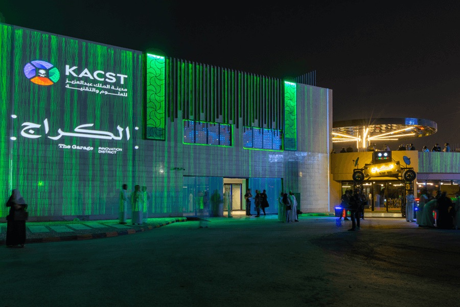 The Garage building on the KACST campus in Riyadh, lit up at night